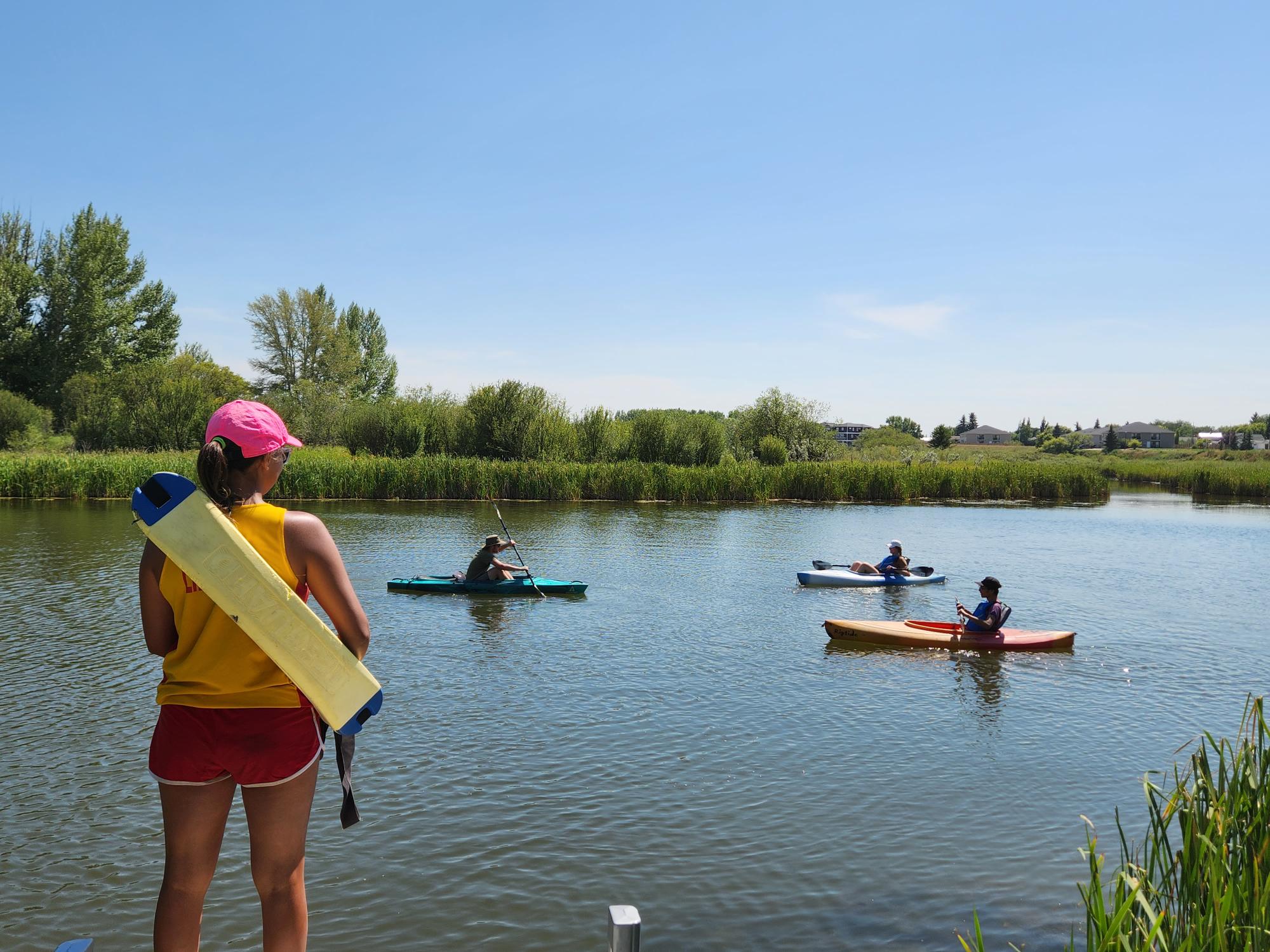 Practicing paddling with pals at this year's Kayak Clinic